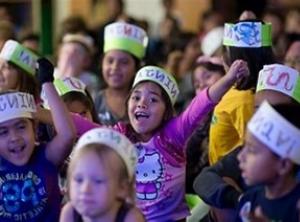 READING ROCK STARS VISITS TO PUBLIC SCHOOLS WITH BOOK DISTRIBUTIONS