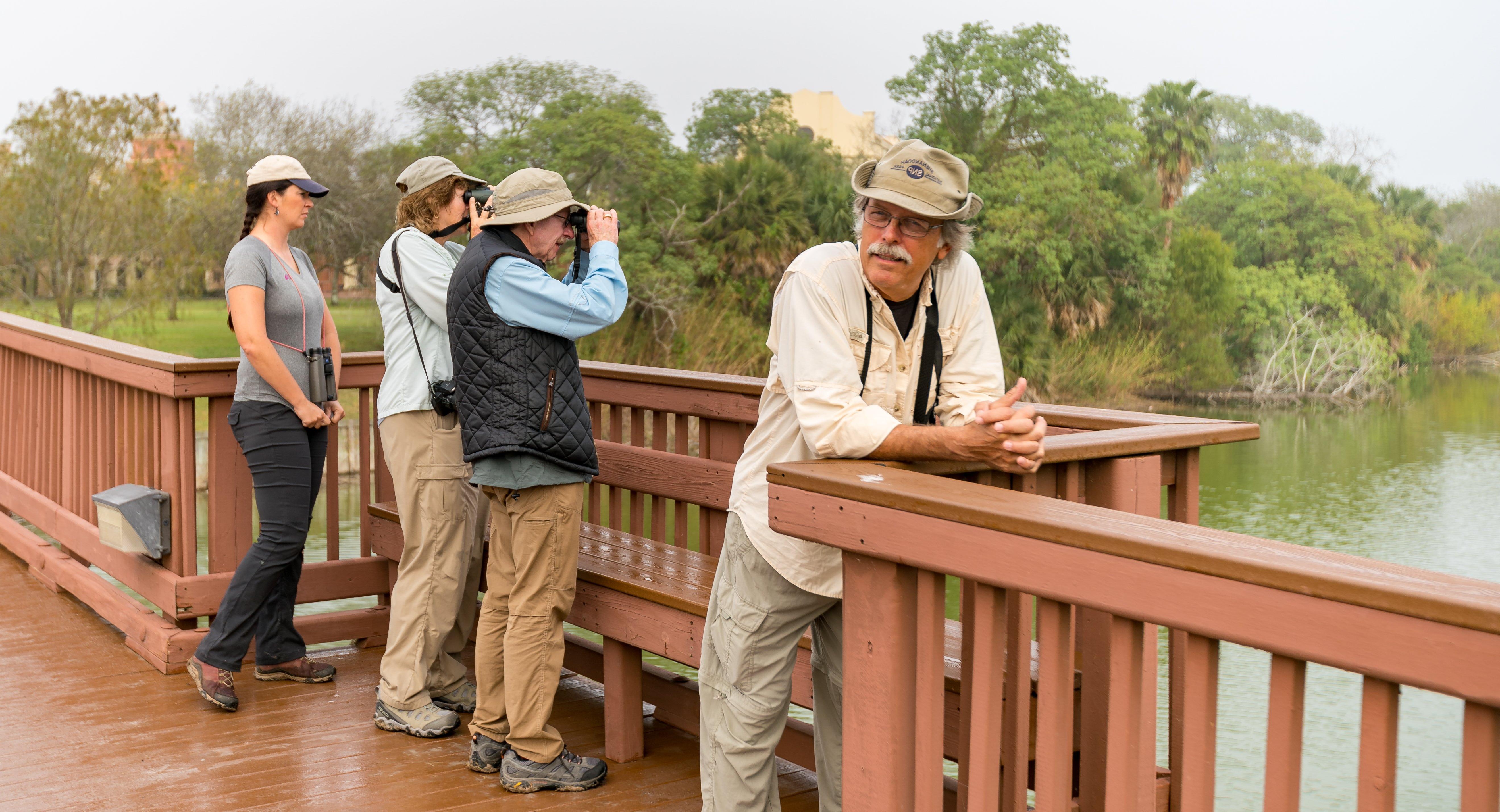 A group enjoys a birding trip at 金沙中国 in 布朗斯威尔